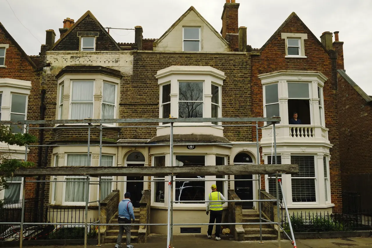 A UK terraced house having all its windows replaced